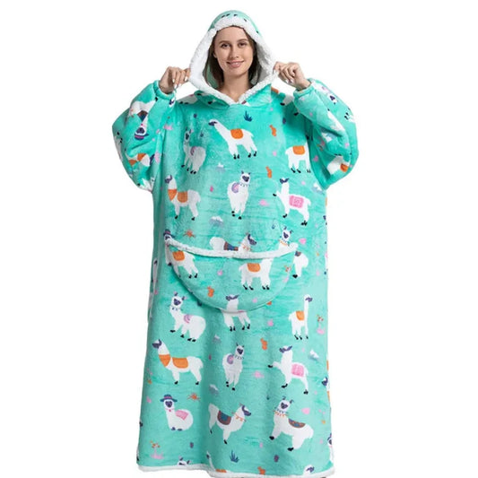 Person in cozy long snuggle hoodie with llama pattern.