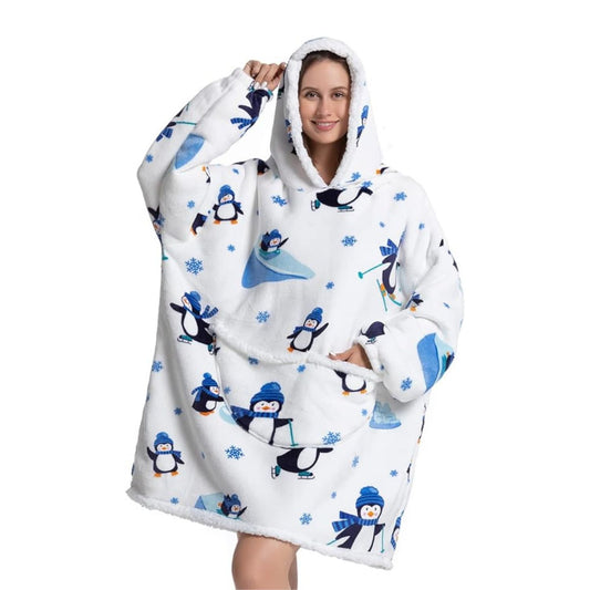 Model cozy in white sherpa blanket hoodie with penguin pattern.