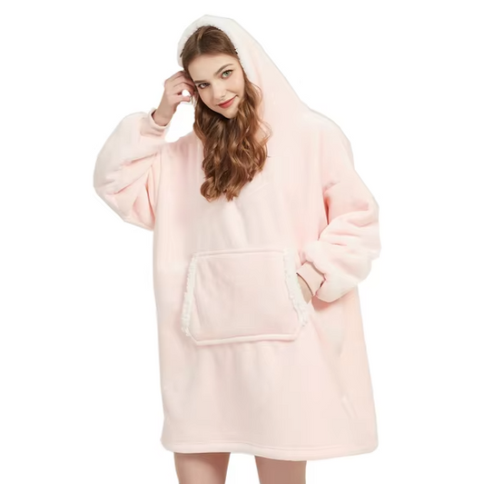 Person in cozy pink sherpa blanket hoodie.