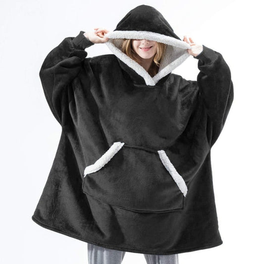 Person in cozy black sherpa blanket hoodie.