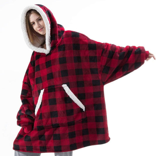 Person in cozy red and black sherpa blanket hoodie.