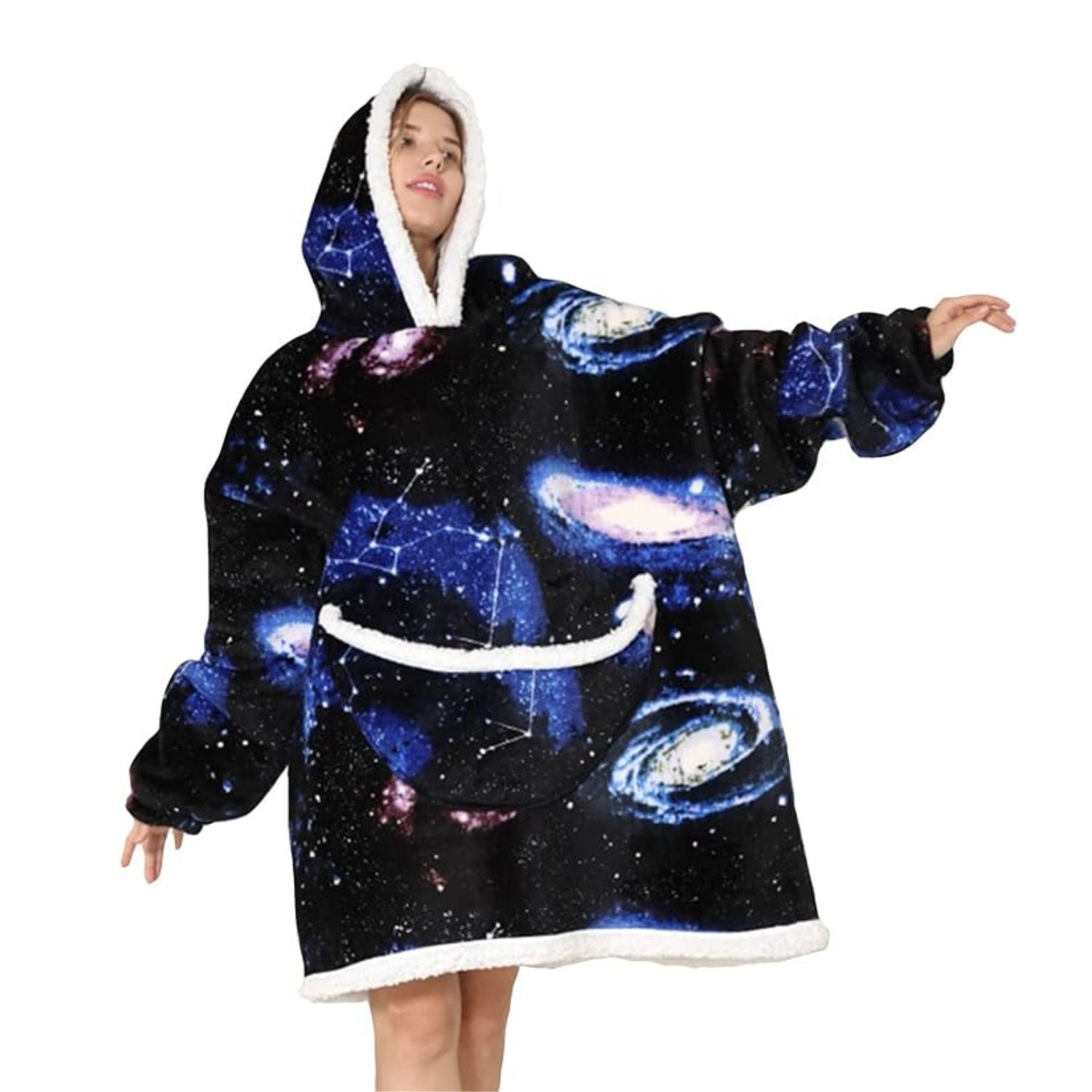 Model wearing black oversized blanket hoodie with space and galaxy pattern. 