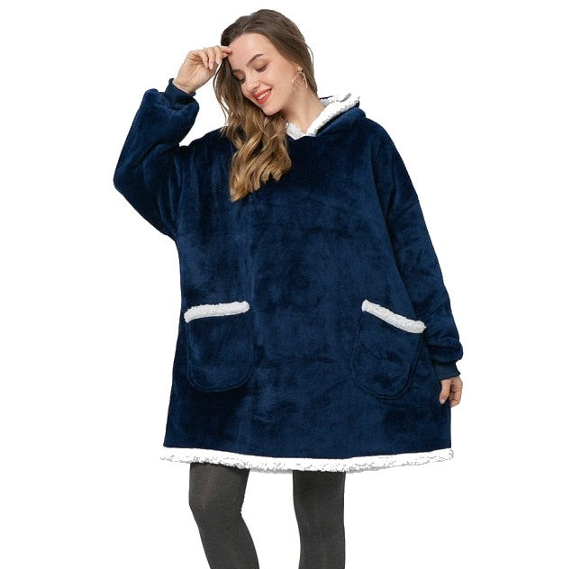 Person in cozy blue sherpa blanket hoodie. 